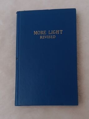 More Light Revised Blue Hardcover Book